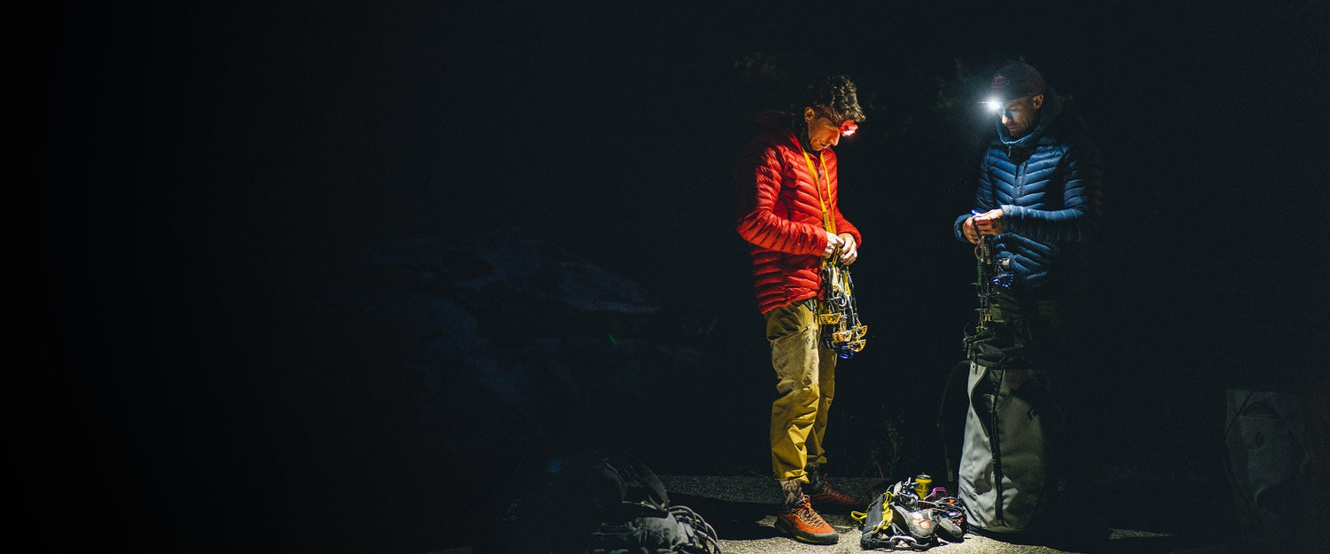 BD employee Adam Peters and BD ambassador Nik Berry illuminated by headlamps