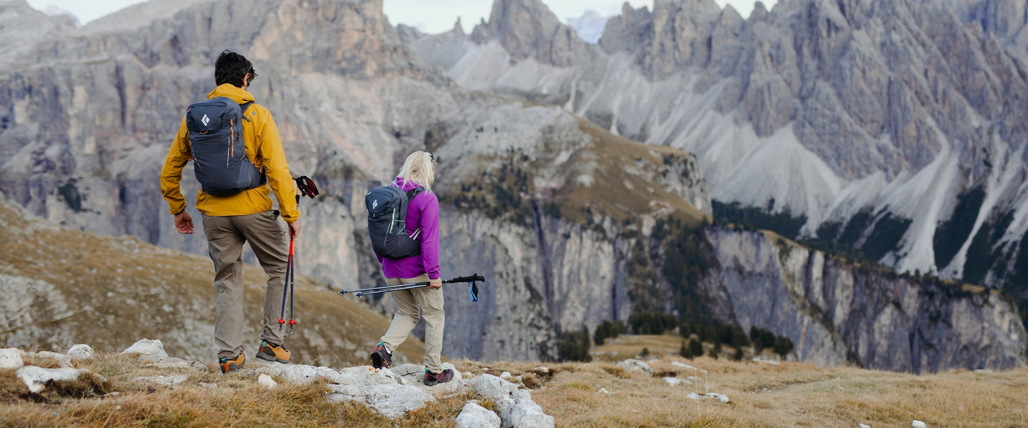 Two hikers on a trail in the Dolomites, Italy