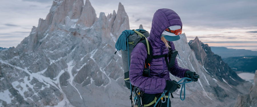 A mountaineer tying a figure 8 in Patagonia