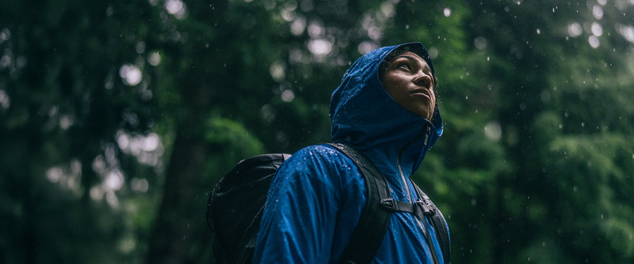 A climber watches the falling rain in Squamish, BC