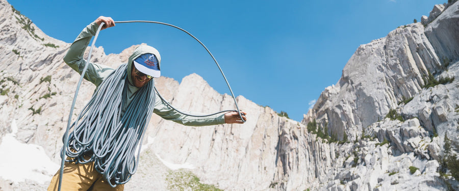 Black Diamond employee Kenny Peterson flakes a rope in the Lone Peak cirque