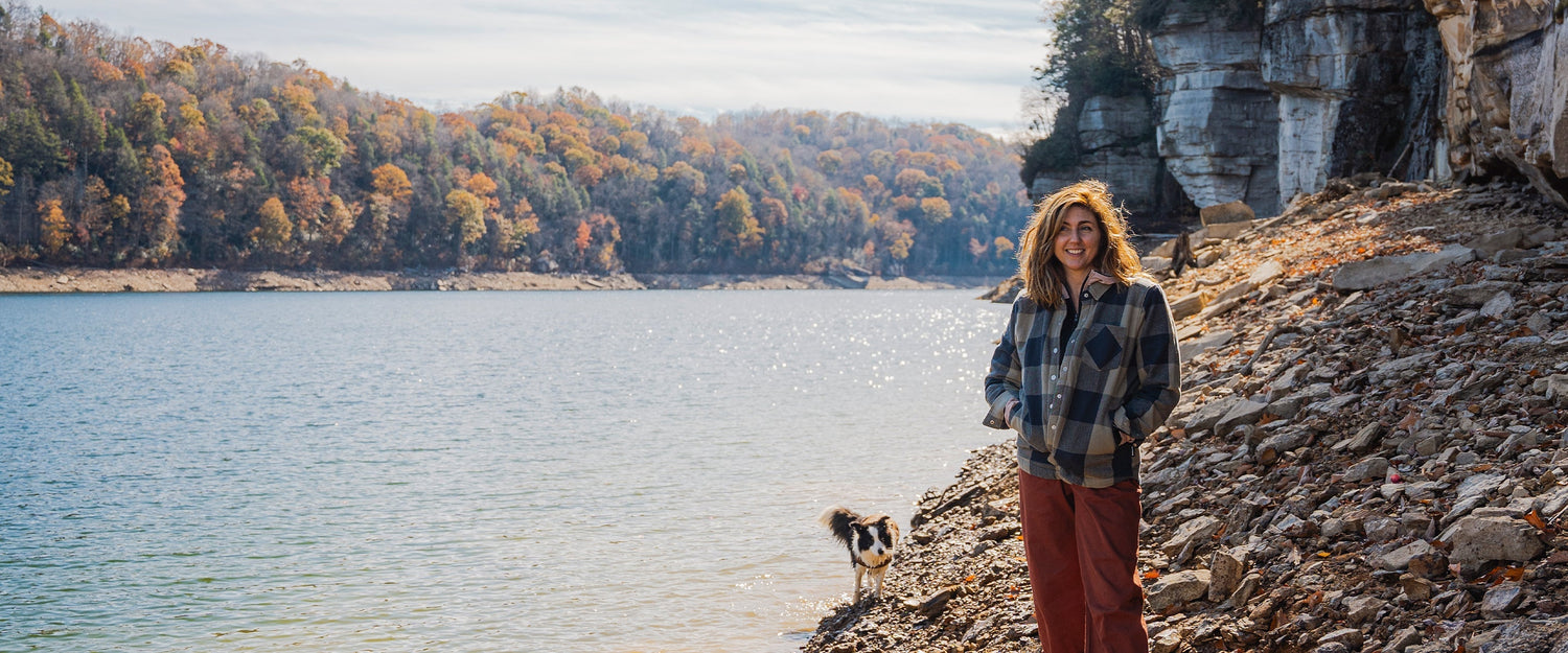 BD athlete Collette Mcinerney stands on a lake shore