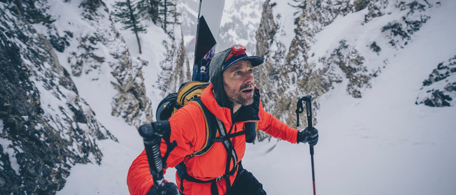 BD employee boots up a couloir in the Wasatch mountains.